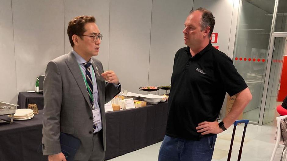 Mark Gan (Senior Manager of ITMA Services) with Dirk Lehman (Publishing Director of TextileTechnology)