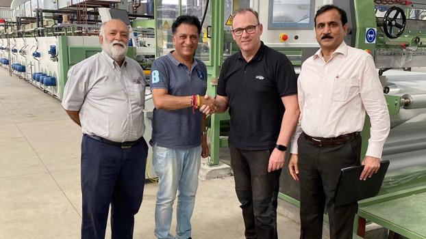 L-to-R: Jayessh S. Nanavati (Sainite Exports), J.R. Mehta (Candour Techtex), Barry Goodwin and Sanjay Jain (Amba's coating technologist in India)(Source BTMA)